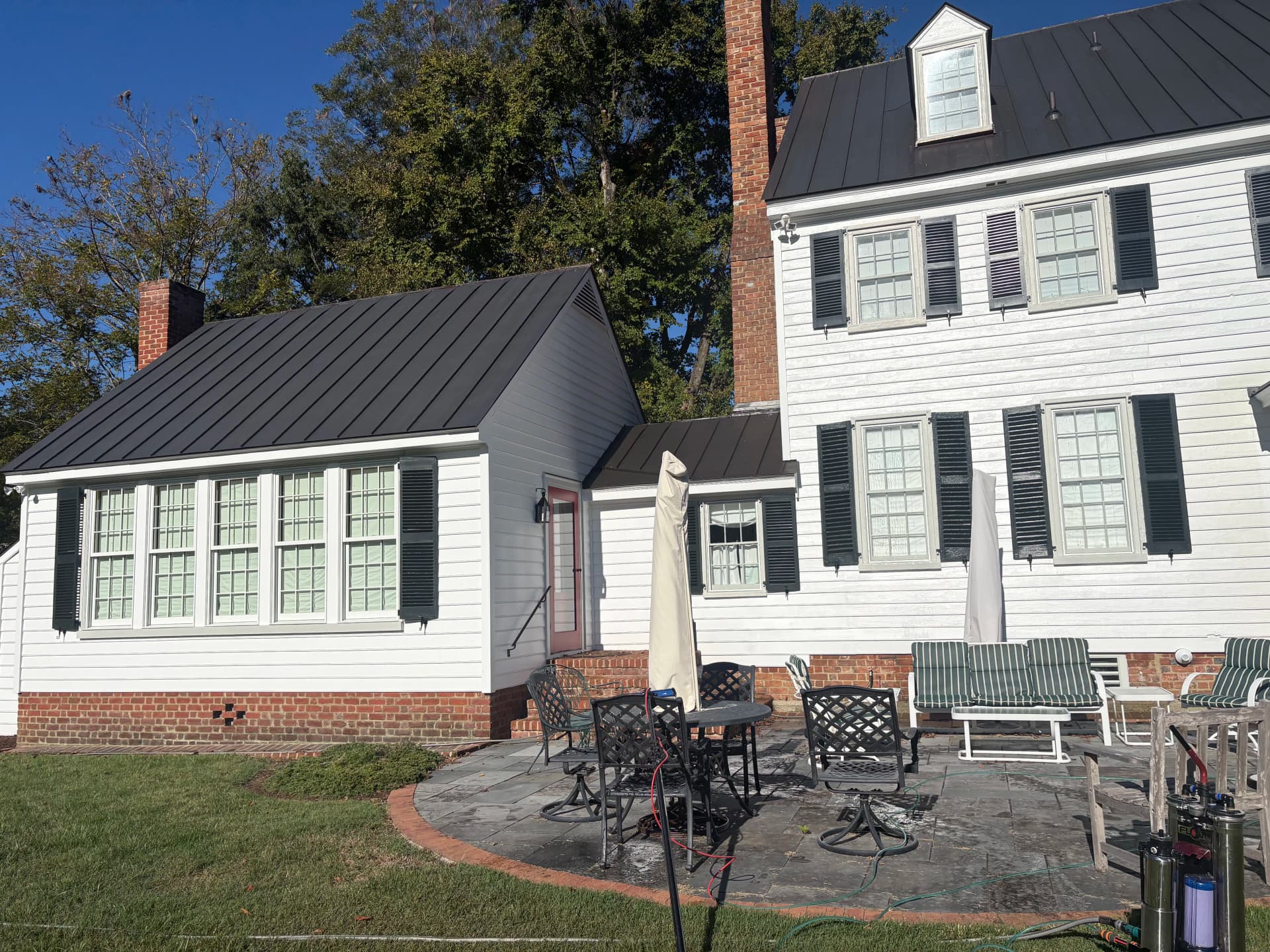 Exterior Cleaning and Storm Window Cleanup at a King William Home image
